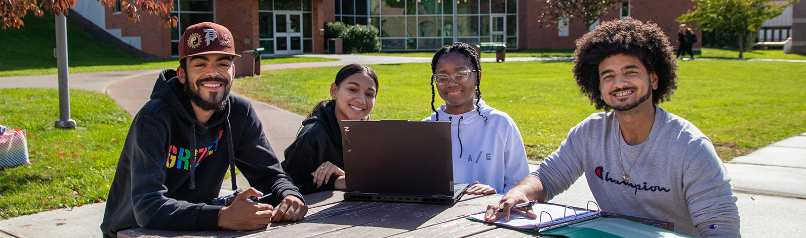 Students studying together outdoors at Columbia-Greene Community College